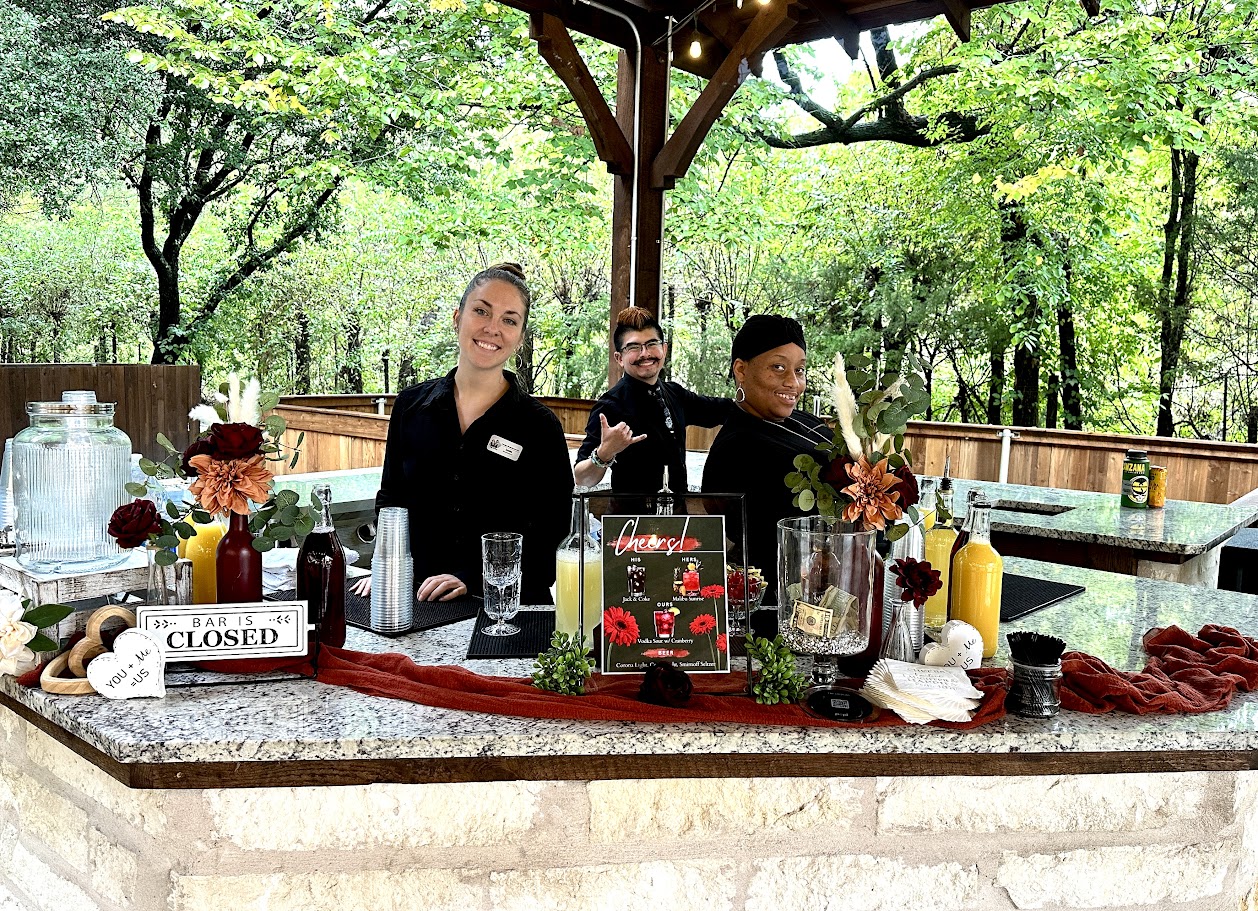 bartenders at outdoor wedding