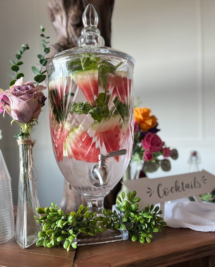 watermelon and mint water in dispenser at event