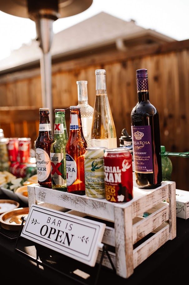 display of wines and beers for wedding bar