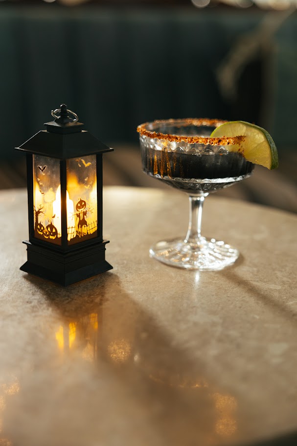 black cocktail at halloween party
