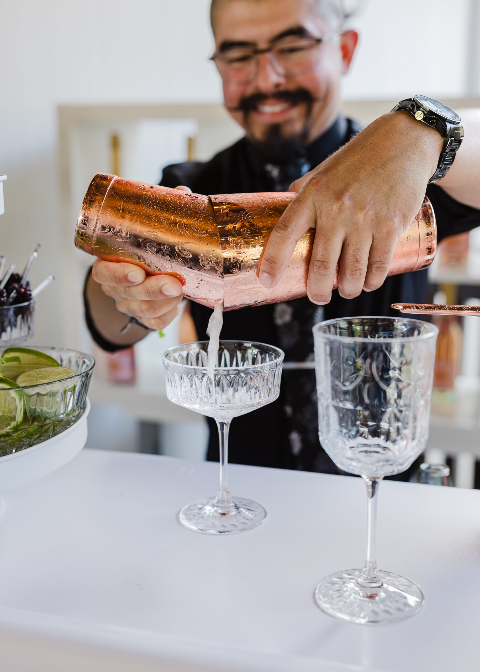 professional bartender crafting cocktail with shaker and fresh ingredients – luxury bartending service Dallas Fort Worth