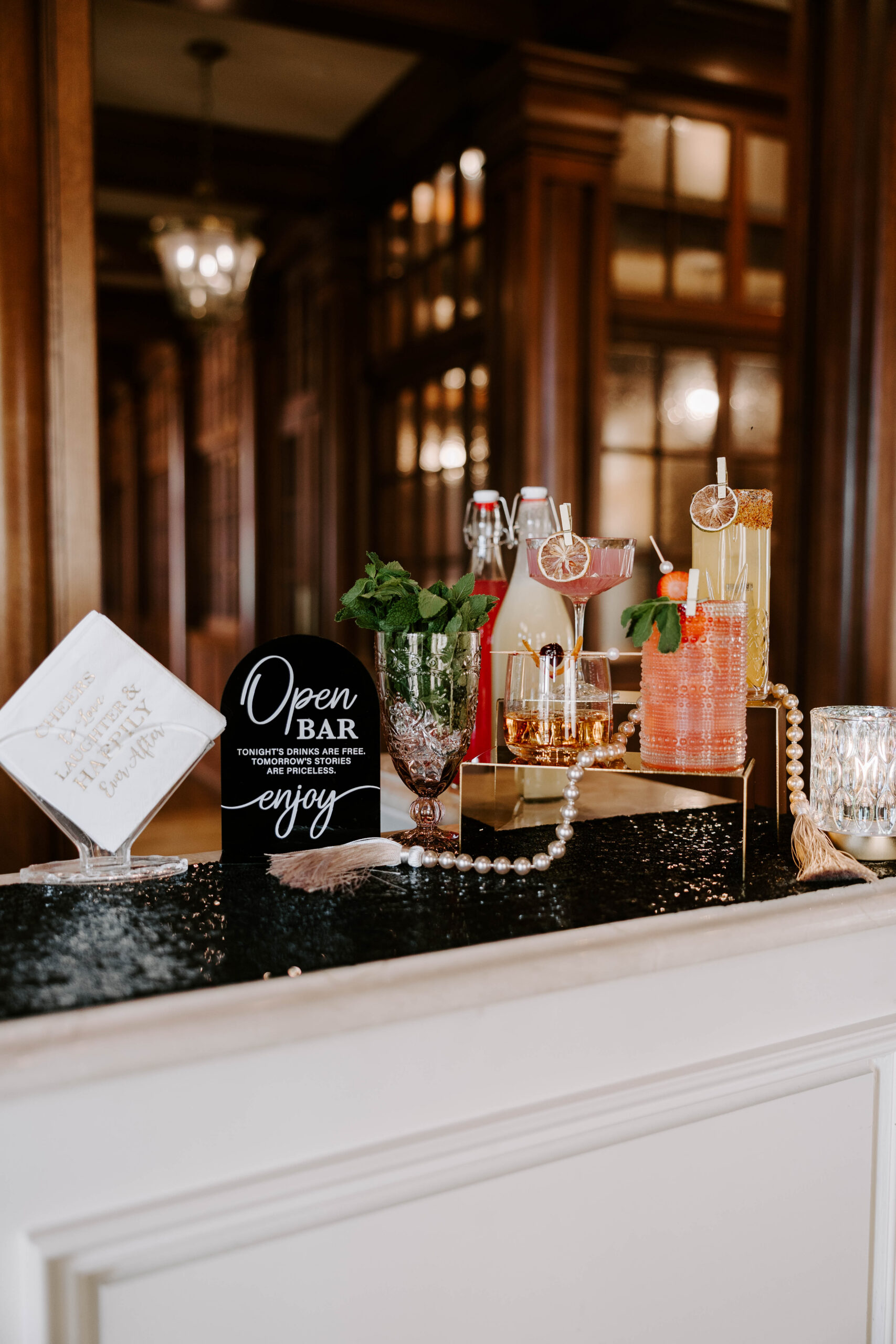 elegant wedding bar setup with handcrafted cocktails, citrus garnishes, and luxury bar display in Dallas Fort Worth