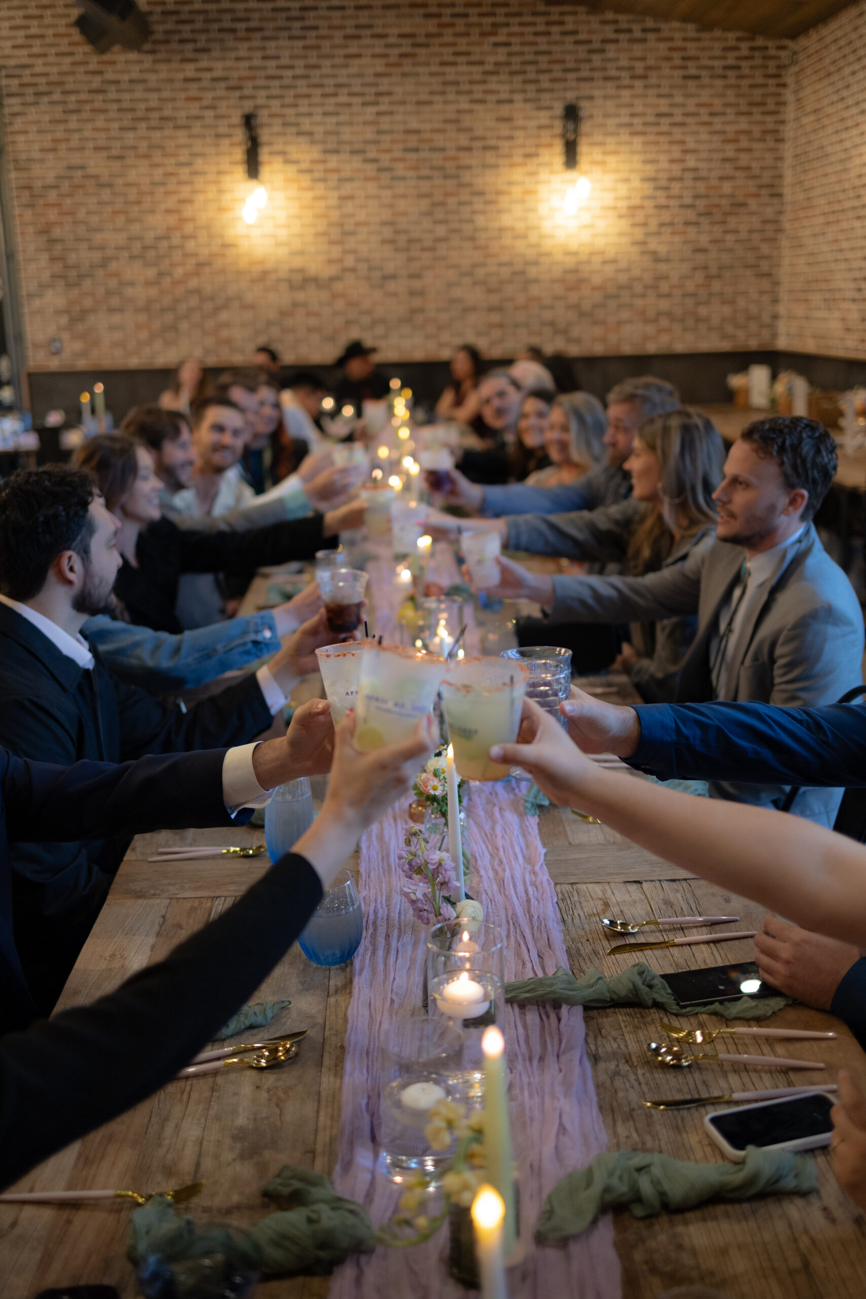 wedding reception with guests enjoying drinks and bartending service in Dallas Fort Worth